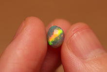 Load image into Gallery viewer, Rolling Flash Black Opal 0.94ct