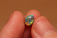 Load image into Gallery viewer, Rolling Flash Black Opal 0.94ct