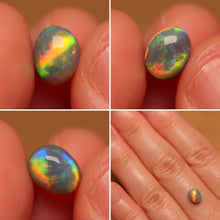 Load image into Gallery viewer, Rolling Flash Black Opal 0.94ct
