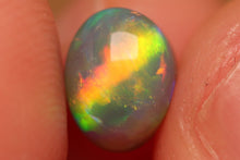 Load image into Gallery viewer, Rolling Flash Black Opal 0.94ct
