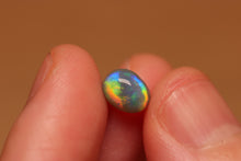 Load image into Gallery viewer, Rolling Flash Black Opal 0.94ct
